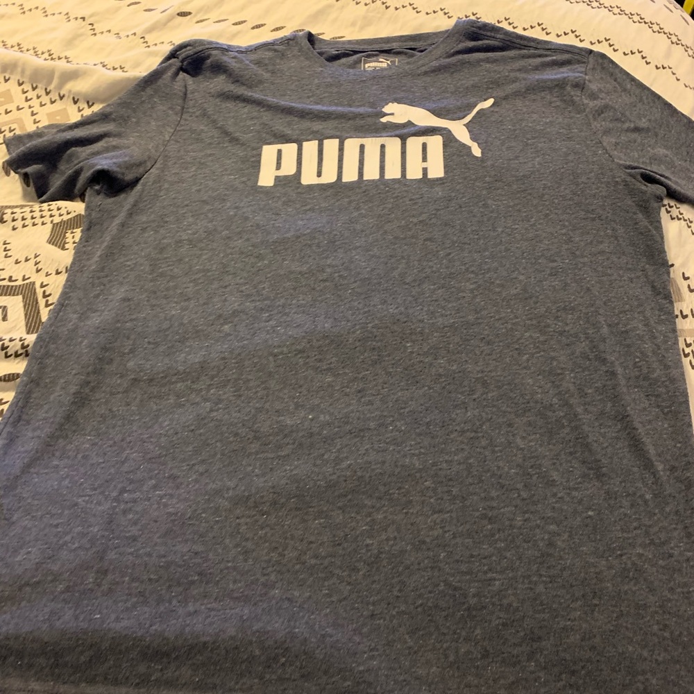 Puma logo shirt size is medium
